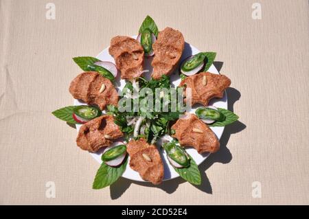 Traditional Lebanese Raw meat kibbeh, Middle eastern or Arabic dishes, and assorted meze