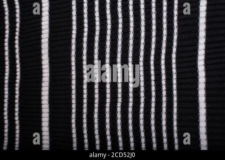 Black and white striped knitted fabric. Close up. Fashionable concept Stock Photo
