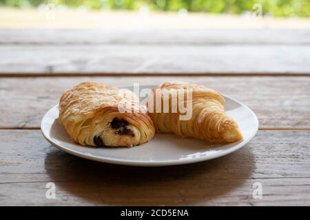 Two Croissants on a white plate Stock Photo