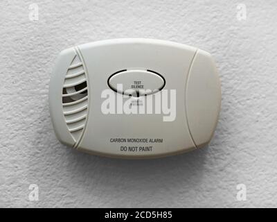 Wall mounted carbon Monoxide alarm installed in a home. Stock Photo