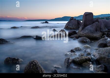 Long exposure in the rockery on the beach of Balikliova Stock Photo