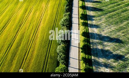 Aerial view of road through rural landscape Stock Photo