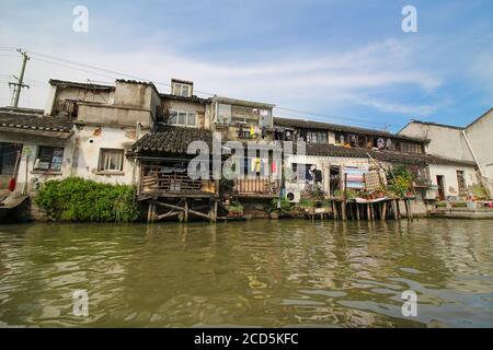 Houses as seen along the picturesque Grand Canal in ancient Suzhou, China Stock Photo