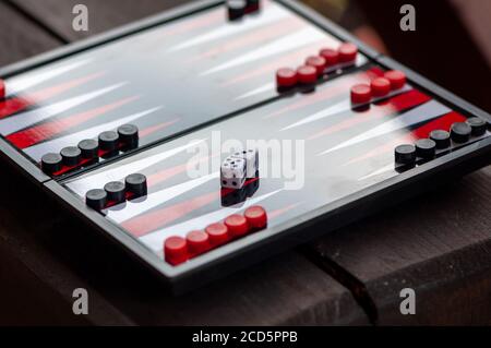 Close-up of a backgammon table. Focus on the dice. Stock Photo