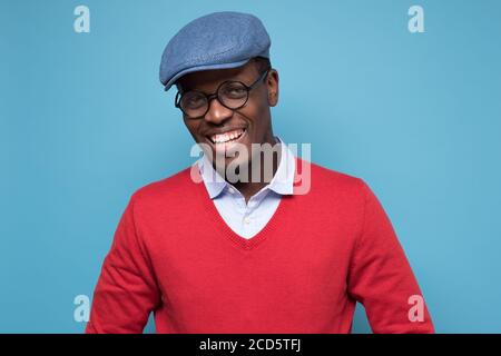 Smiling happy african man in glasses looking confident at camera Stock Photo