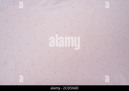 Pale knitted fabric background in fine point. Backdrop in pastel colors. Copy space Stock Photo