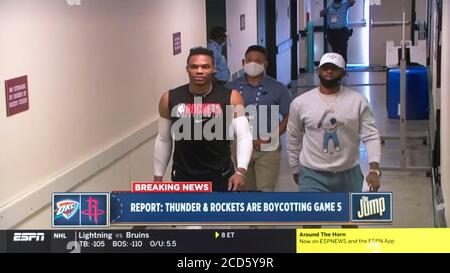 August 26, 2020, Orlando, Florida, USA - A screen grab from ESPN's coverage of the Milwaukee Bucks refusing to play today's scheduled playoff game against the Orlando Magic. After a team meeting, the Bucks decided to boycott their game in the wake of the shooting of yet another Black man, Jacob Blake, at the hands of a white policeman, this time in Kenosha, Wisconsin. After the Bucks declined to play, the Rockets also decided to boycott. Other teams have now joined the boycott, and no playoff games will be played tonight.(Credit Image: © Courtesy Espn/ZUMA Wire) Stock Photo