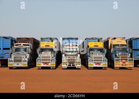 A line of parked road train trucks, Northern Territory, Australia. Stock Photo