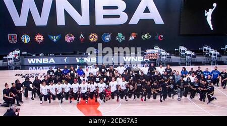 A screen grab from the ESPN2 coverage of the decision made by the six WNBA teams not to play tonight in the wake of the shooting of yet another Black man in America. The Washington Mystics donned t shirts spelling out the name of Jacob Blake, who was shot seven times in the back by a white Kenosha, Wisconsin policeman. Seven holes were cut out of the backs of their shirts, depictions of the seven bullet holes in Mr. 26th Aug, 2020. Blake's back. All of tonight's NBA playoff games were also postponed. Credit: Courtesy Espn2/ZUMA Wire/Alamy Live News Stock Photo