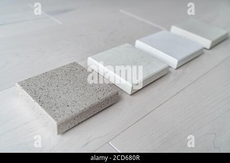 Kitchen remodel home renovation interior design consultation for countertop choices - quartz sample at store Stock Photo