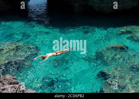 Woman relaxing in Niue Stock Photo