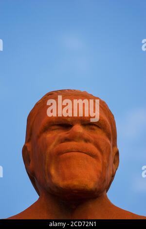 Wirin. The nine metre high ductile iron sculpture. Wirin face close up isolated on blue sky background. By Tjyllyungoo - Lance Chadd, Trish Robinson a Stock Photo