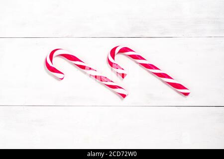 christmas festive background with candy cane. two heart-shaped candy canes Stock Photo