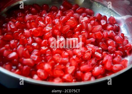Close up of red color  pomegranates seeds, selective focusing Stock Photo