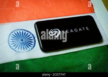 Kolkata, India 27-Aug-2020 : Concept of Apple launching mobile service in India. Apple logo in mobile phone screen with Indian flag background and cop Stock Photo