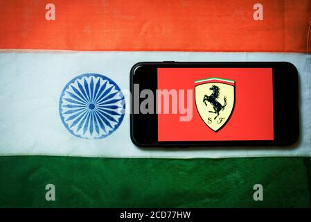 Kolkata, India 27-Aug-2020 : Concept of Apple launching mobile service in India. Apple logo in mobile phone screen with Indian flag background and cop Stock Photo