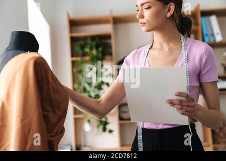 Photo female clothes on a mannequin with bag. Concepts of shopping