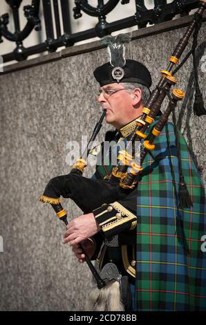 bagpipe player in music of strangers