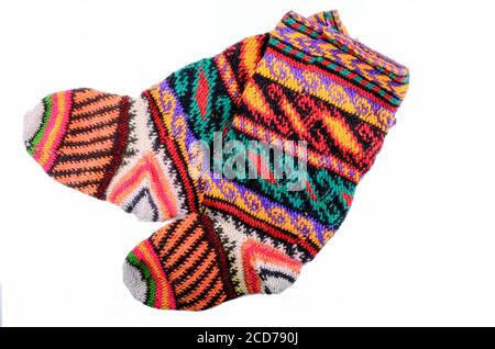 Multi-colored knitted woolen socks isolated on white background Stock Photo