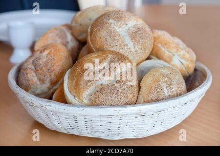 Freshly Baked Danish Bread Rolls in a Basket Stock Photo