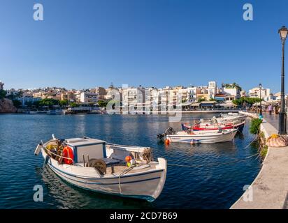 Agios Nikolaos, Greece - August 18, 2020 - View over the traditional harbor at Voulismeni lake in Agios Nikolaos on the island of Crete Stock Photo