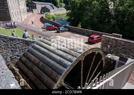 Water wheel at site of Mill 4 at New Lanark World Heritage Site, New Lanark, Lanarkshire, Scotland, UK Stock Photo