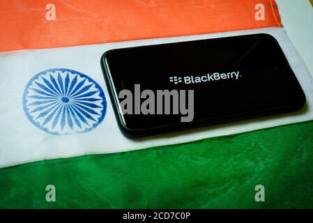 Kolkata, India 27-Aug-2020 : Concept of Apple launching mobile service in India. Apple logo in mobile phone screen with Indian flag background and cop Stock Photo