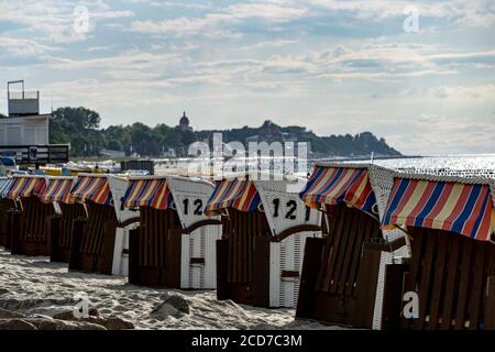 Beach baskets stand on the beach of the Baltic Sea, Kuehlungsborn Stock Photo