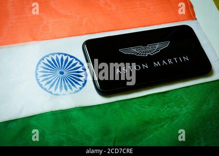 Kolkata, India 27-Aug-2020 : Concept of Apple launching mobile service in India. Apple logo in mobile phone screen with Indian flag background and cop Stock Photo