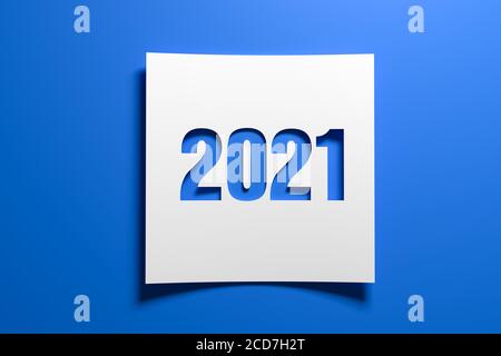 A piece of curved memo paper with the cut out number 2021 on blue background. Concept for events in the year 2021 and New Year 2021. Stock Photo