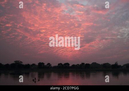 Fishpond sunset, looking over Mai Po Marshes Nature Reserve, Deep Bay, Hong Kong, China 7th Dec 2016 Stock Photo