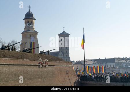 Alba Iulia, Romania - 01.12.2018: Artillery guns and the Reunification Cathedral in the background Stock Photo