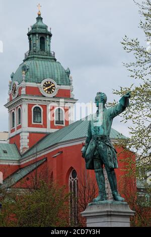 Statue of Charles XII, king of Sweden, against  Saint James's Church in Kungsträdgården, King's Garden in central Stockholm, Sweden Stock Photo