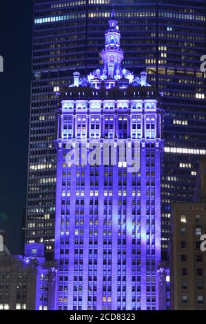 The Helmsley building in New York City was lit up purple in honor of the suffrage centennial on Women’s Equality Day (August 26, 2020). Stock Photo