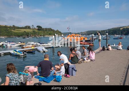 Families crabbing in the Devon seaside town of Salcombe in the South Hams Stock Photo