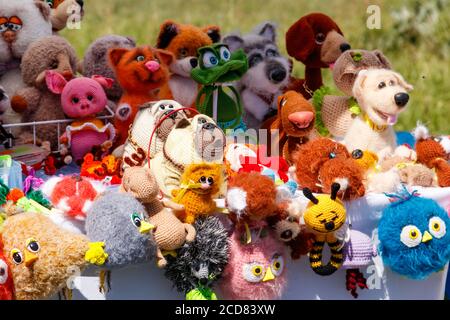 Group of handmade soft fabric toys for sale Stock Photo