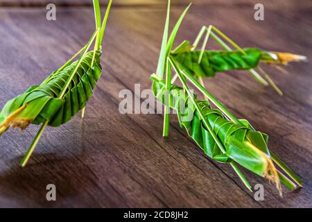 Grasshoppers made from banana leaves Stock Photo