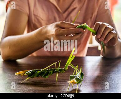 Grasshoppers made from banana leaves Stock Photo