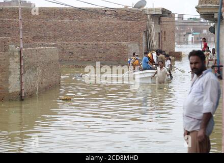 Hyderabad, Pakistan. 27th Aug, 2020. A view of Maher Ali colony which is affected by the flood and rescue operation is in process (Photo by Jan Ali Laghari/Pacific Press) Credit: Pacific Press Media Production Corp./Alamy Live News Stock Photo