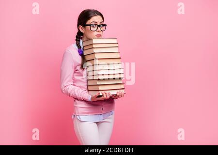 portrait of teenage girl carrying pile of books Stock Photo - Alamy