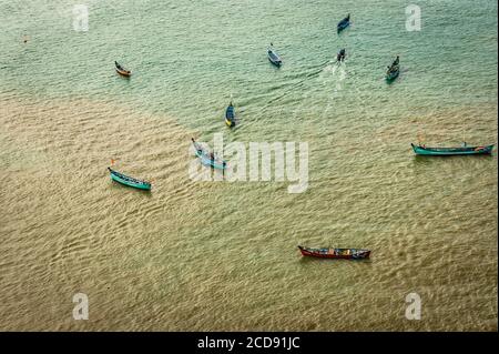 fishing boats isolated many in deep sea aerial shots image is take at murdeshwar karnataka india at early morning. it is the very holy as well as tour Stock Photo