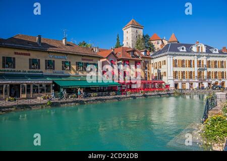 France, Haute Savoie, Annecy, the old town, Quai Perriere on Thiou river banks and the Musee Ch?teau (Castle Museum) old town on the Thiou river banks, former jails of Palais de l'Isle and the Isle Quays Stock Photo