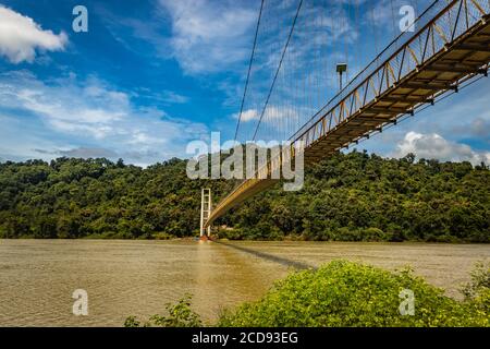 suspension iron cable bridge isolated with bright blue sky from unique different angle image is taken at honnavar karnataka india. it is the fine exam Stock Photo