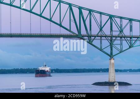 Canada, Quebec, Trois-Rivieres, sunrise over the St. Lawrence River and Laviolette Bridge Stock Photo