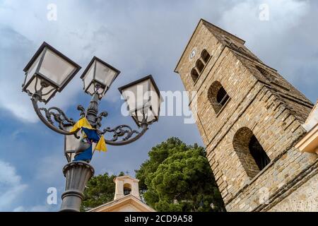 The Bell tower of Romanesque Pontifical Basilica of Santa Maria de Gulia, in Castellabate. Castellabate is a Small medieval Town in a Southern coast of Campania, Italy. Stock Photo