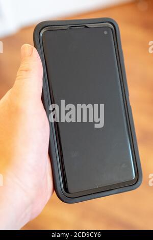 Hand of a man holding a Samsung Galaxy S10 smart phone, San Ramon, California, June 5, 2020. () Stock Photo