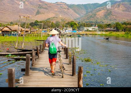 Myanmar (Burma), Shan State, Inle Lake, Tek Wooden Pier in Maing Thauk Village Stock Photo