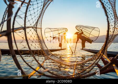 Myanmar (Burma), Shan State, Inle Lake, Intha fishermen with their conical net Stock Photo