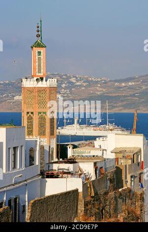 Morocco, Tangier Tetouan region, Tangier, Mosque minaret emerging from the roofs of the Kasbah on the bottom of a cruise ship in Tangier Bay Stock Photo