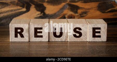 reuse word written on wooden blocks. Ecology concept Stock Photo